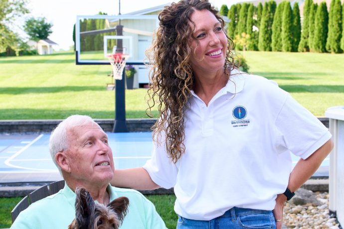 A Caregiver and client enjoying the yard