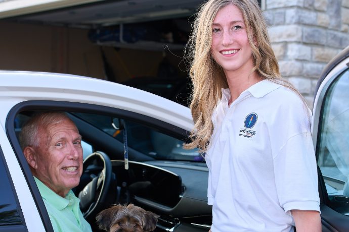 A Caregiver driving a client to an appointment